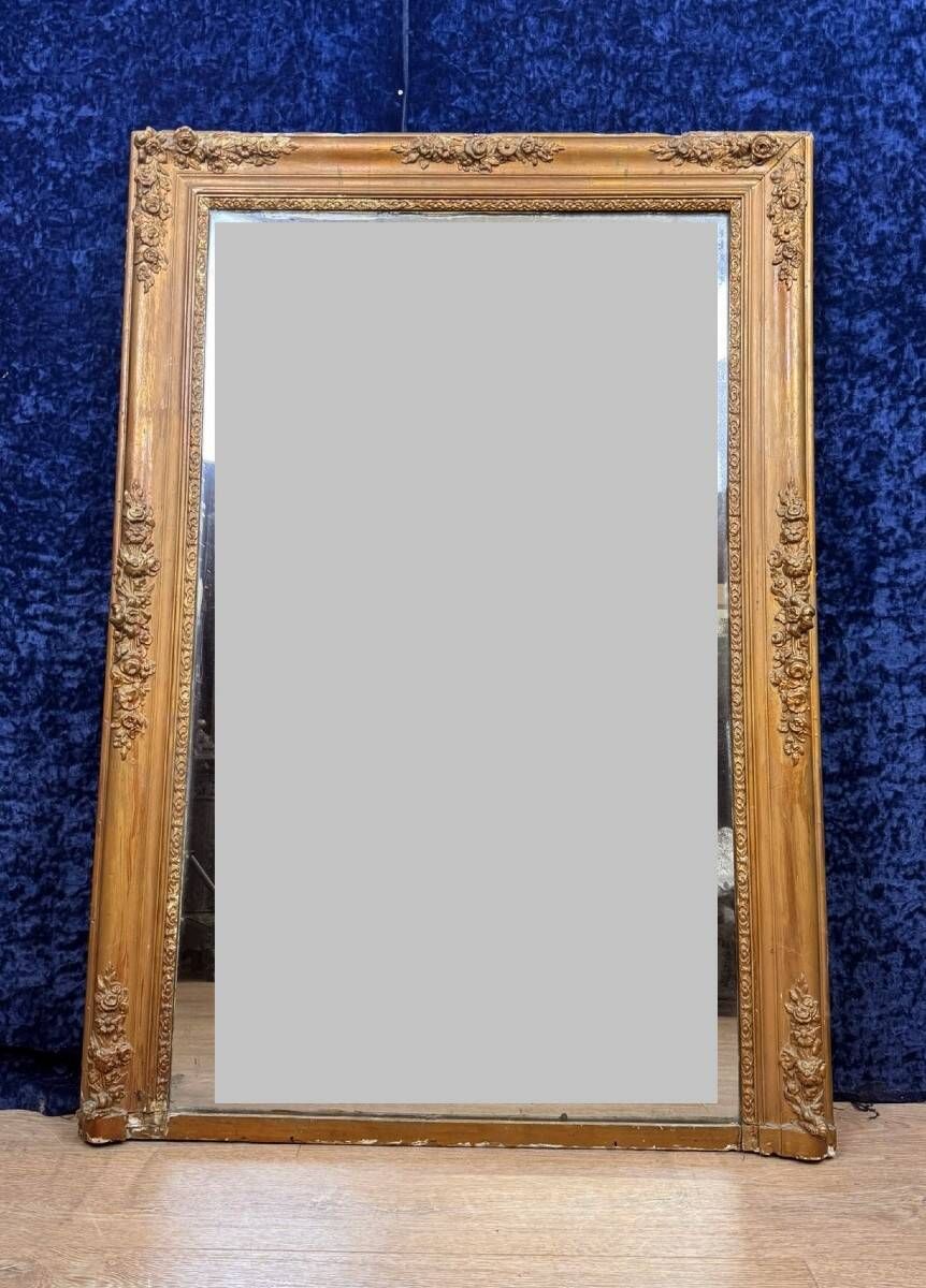 Empire period mirror in wood and gilded stucco circa 1810-1820