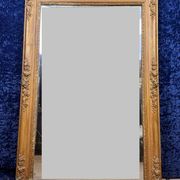 Empire period mirror in wood and gilded stucco circa 1810-1820