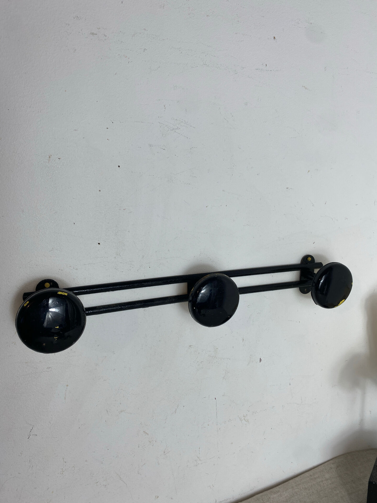 Vintage metal wall coat rack