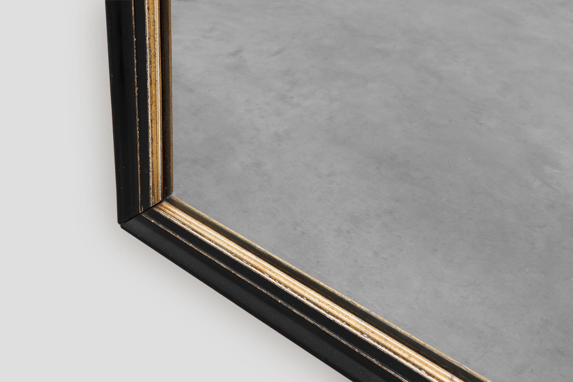 Black laquered and gilted wooden Louis Philippe mirror, France ca. 1850