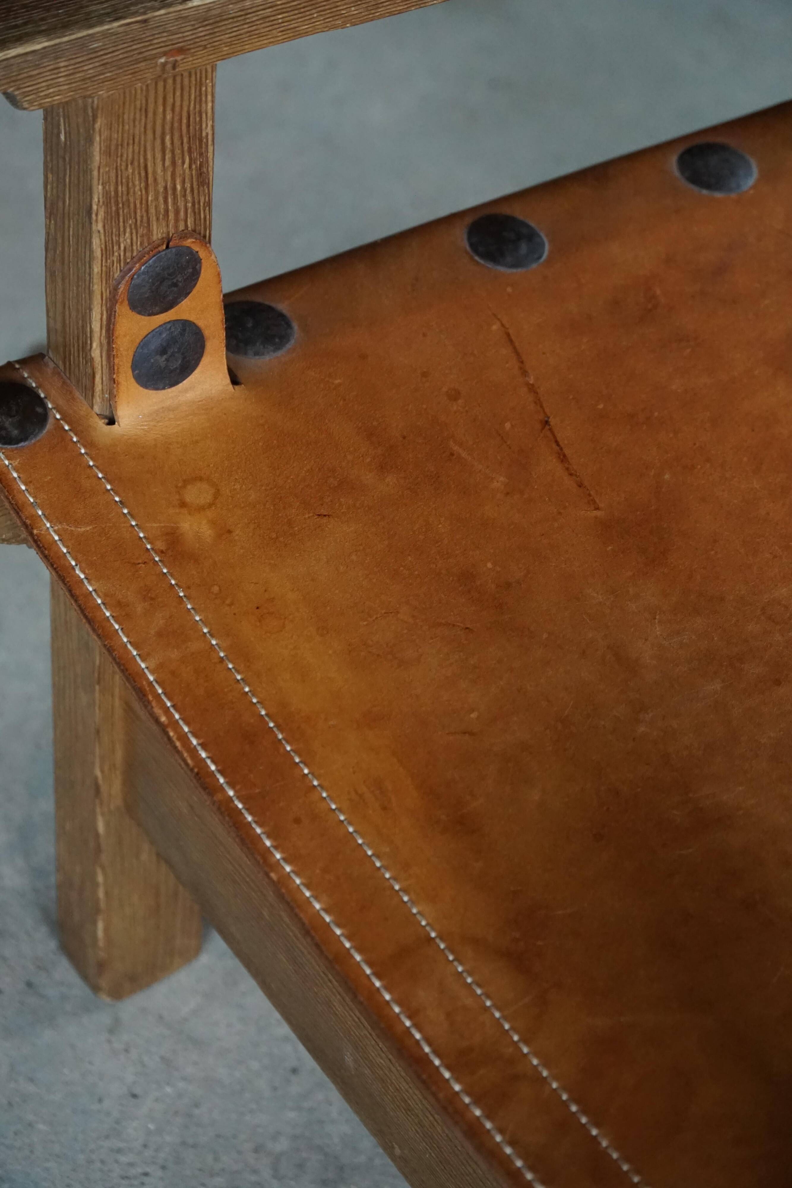 Pair of Spanish brutalist armchairs from the 1960s, wood and leather.