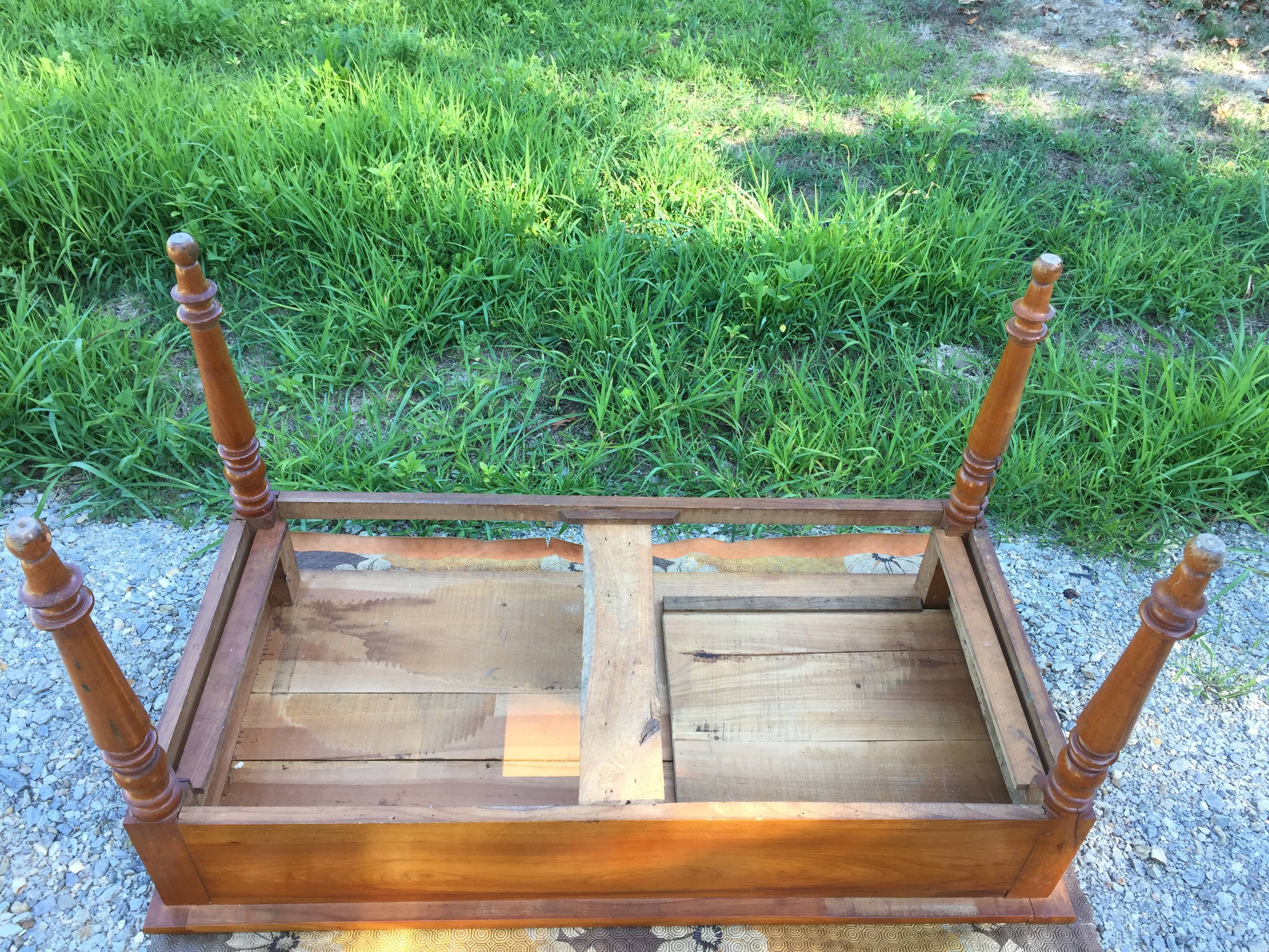 Old farmhouse table louis Philippe style in solid cherry with turned feet.