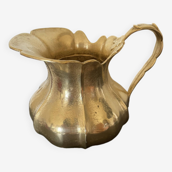 Golden brass pitcher