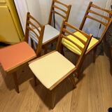 A set of 4 compass chairs from the 50s/60s