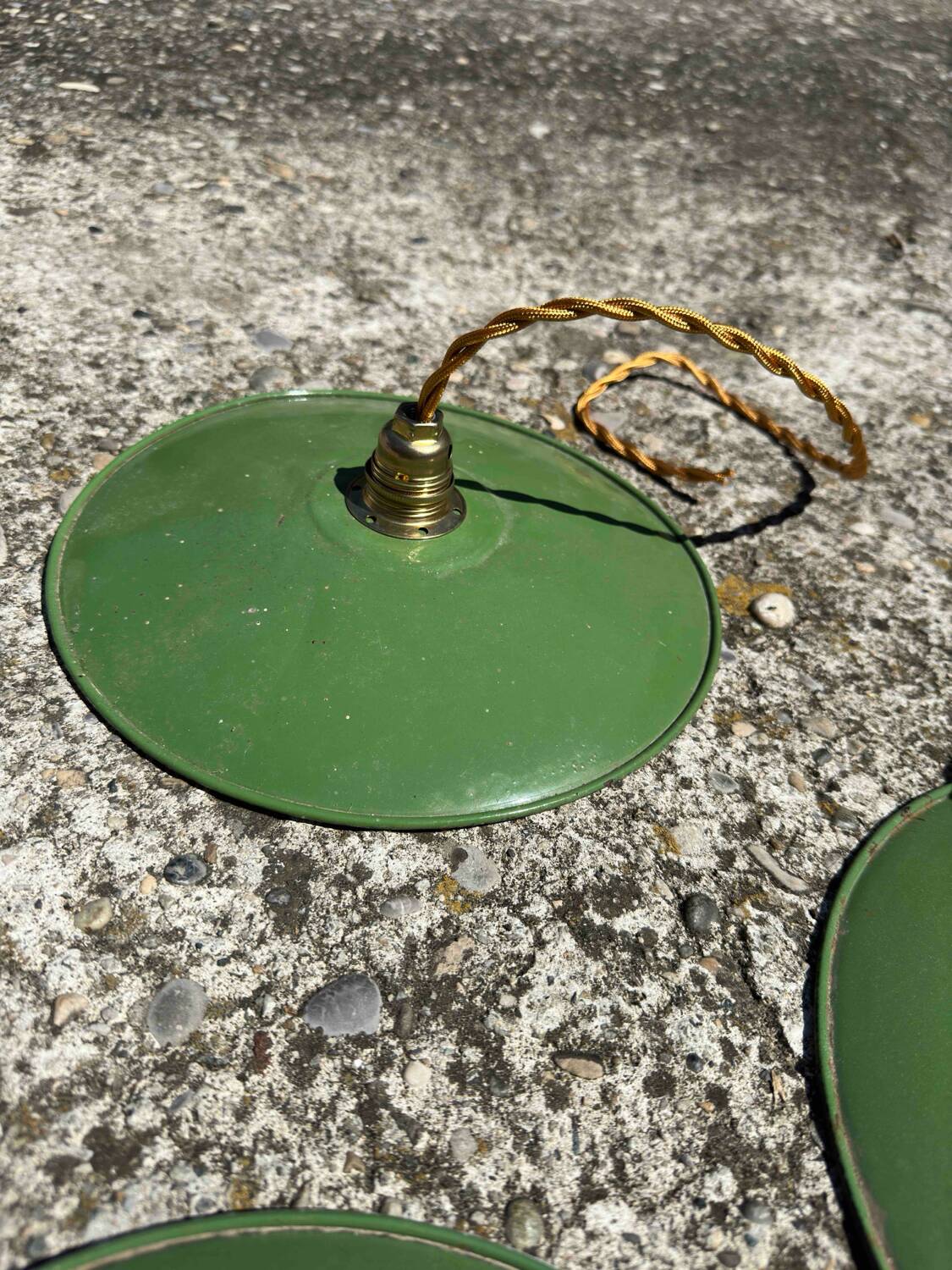 Trio of vintage pendant lampshades in enamelled sheet metal with gold threads