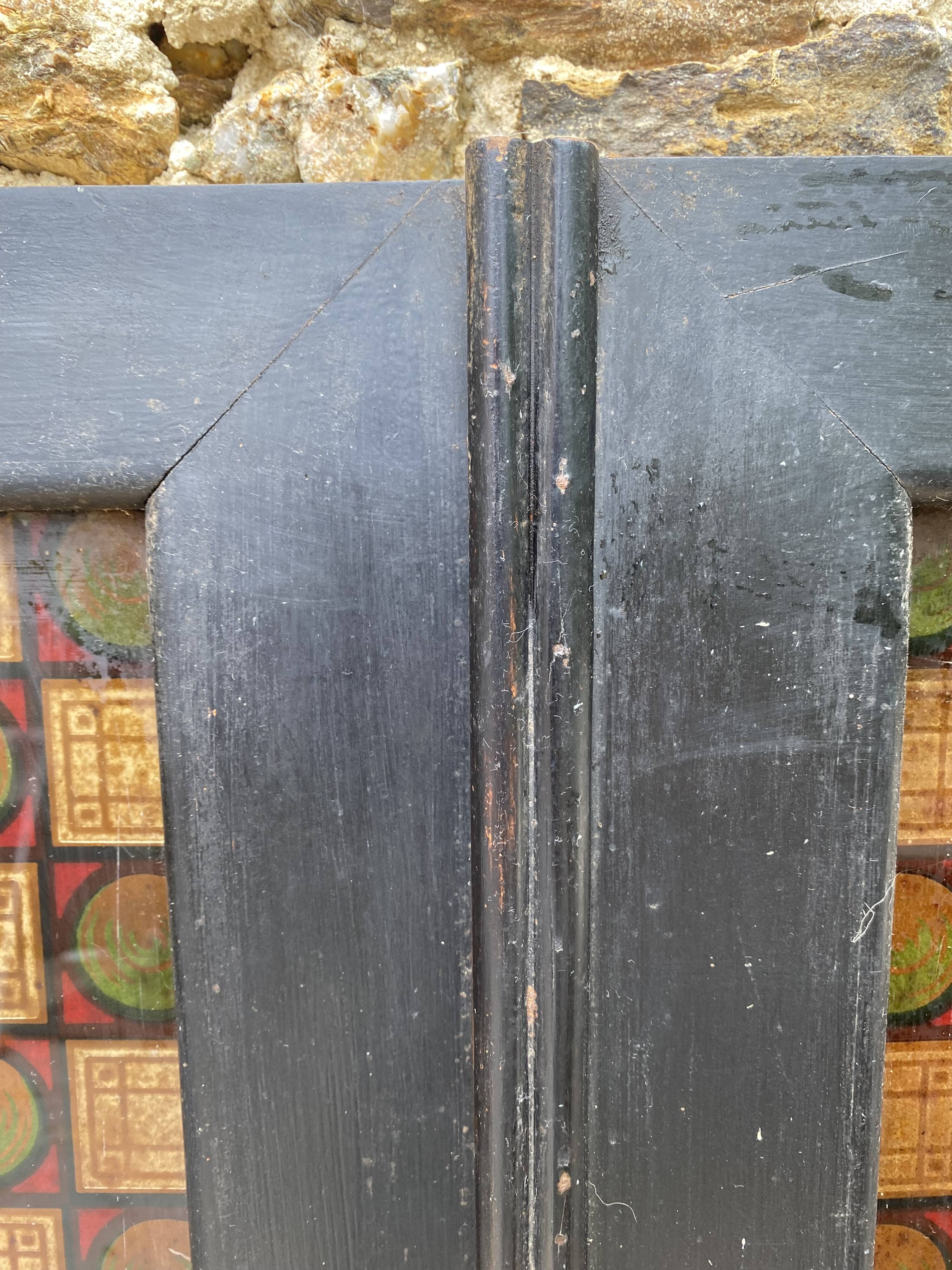 Double wood and glass closet doors