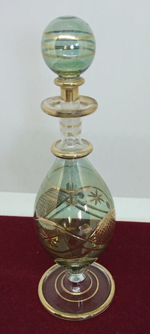 Vial / perfume bottle in tinted and cut glass golden border