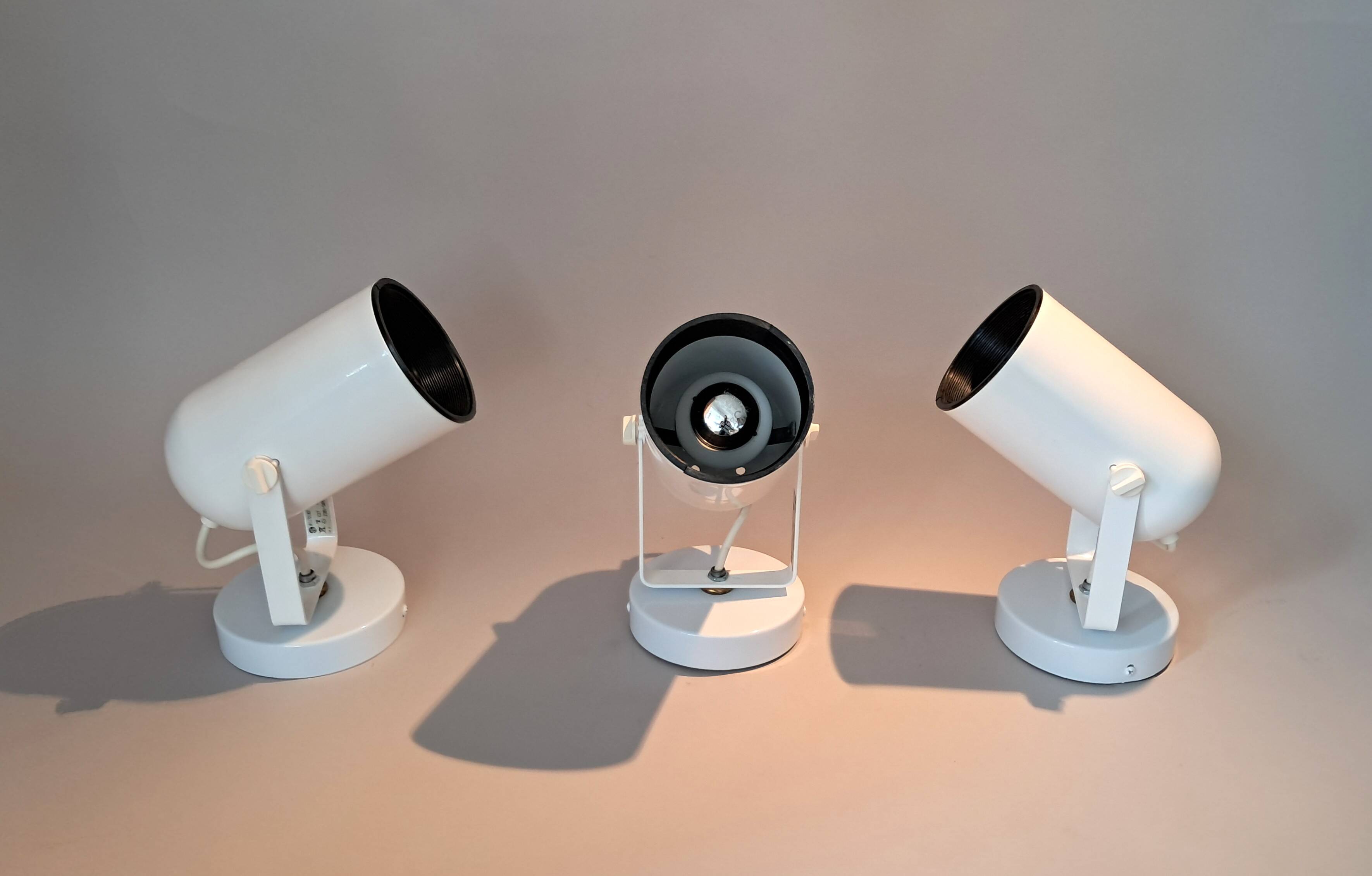 3 white lacquered metal wall lights from the 1970s.
