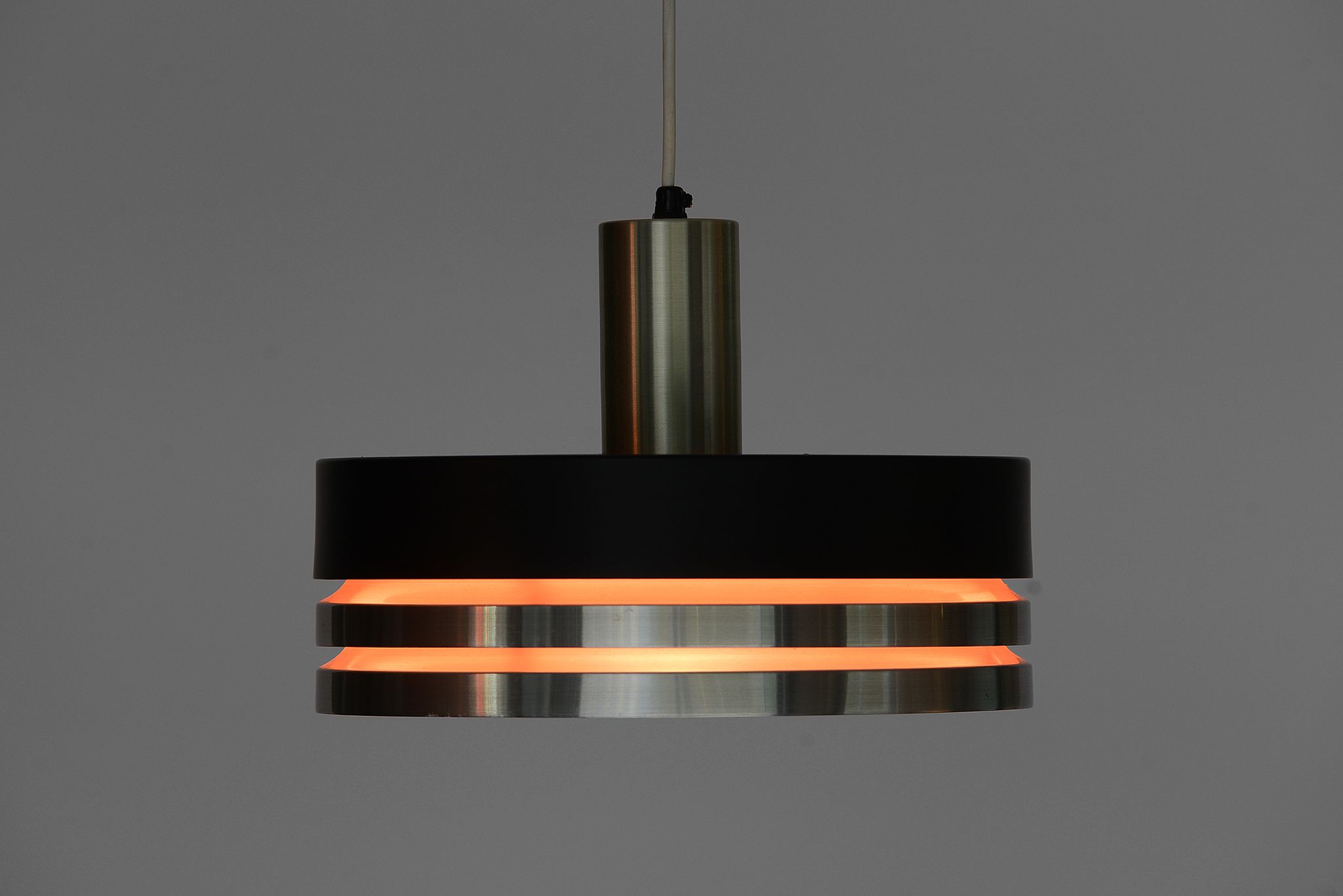 Pendant light in brushed aluminium and black by Carl Thore for Granhaga. Sweden 1960s.