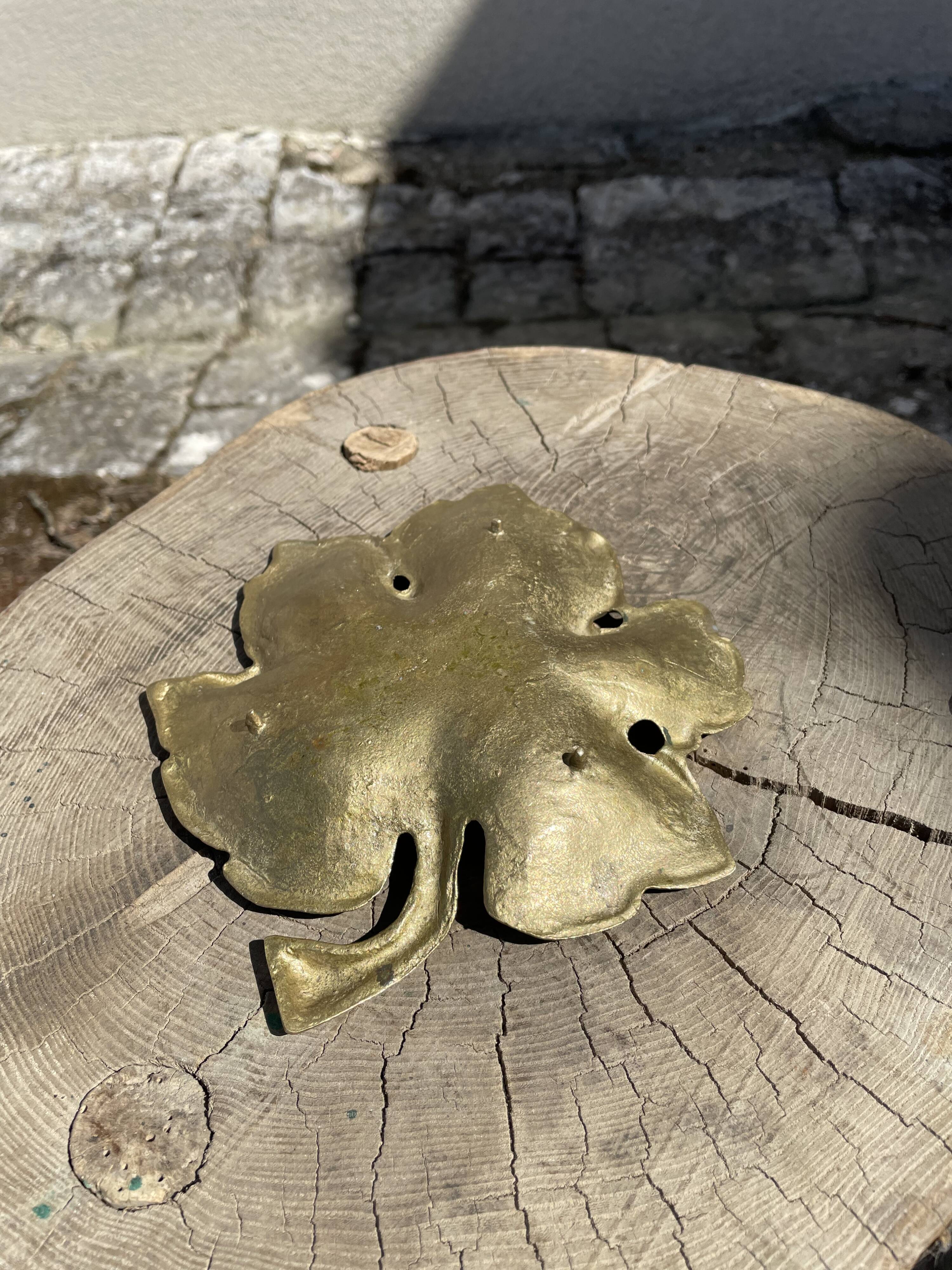 Empty brass leaf pocket