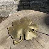 Empty brass leaf pocket