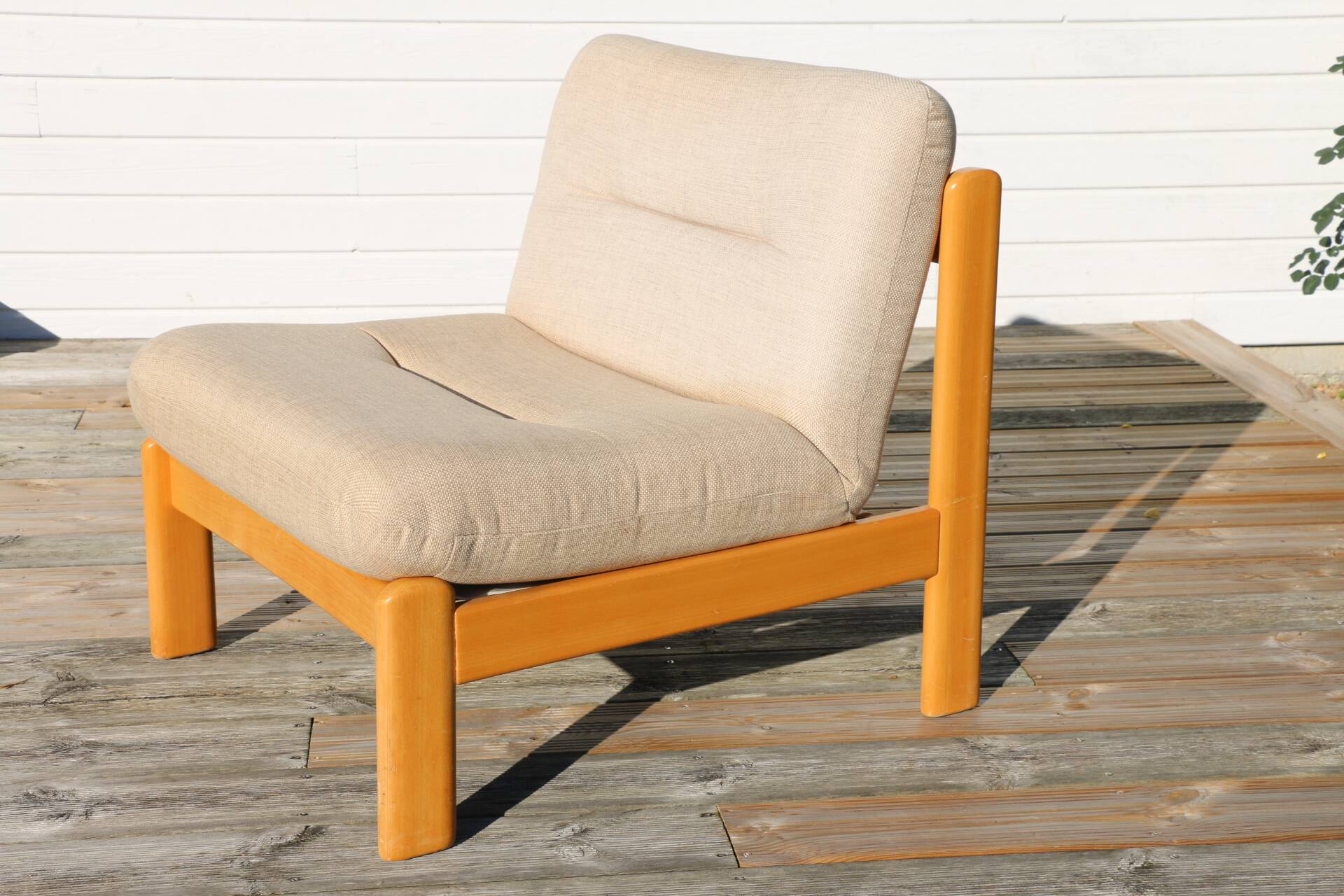 Pair of wood and fabric lounge chairs, 1980
