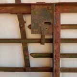 Old riveted metal gate