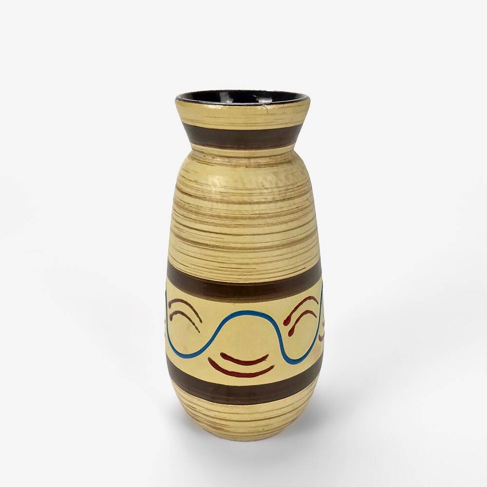 Ethnic trendy striated ivory vase from the 60s