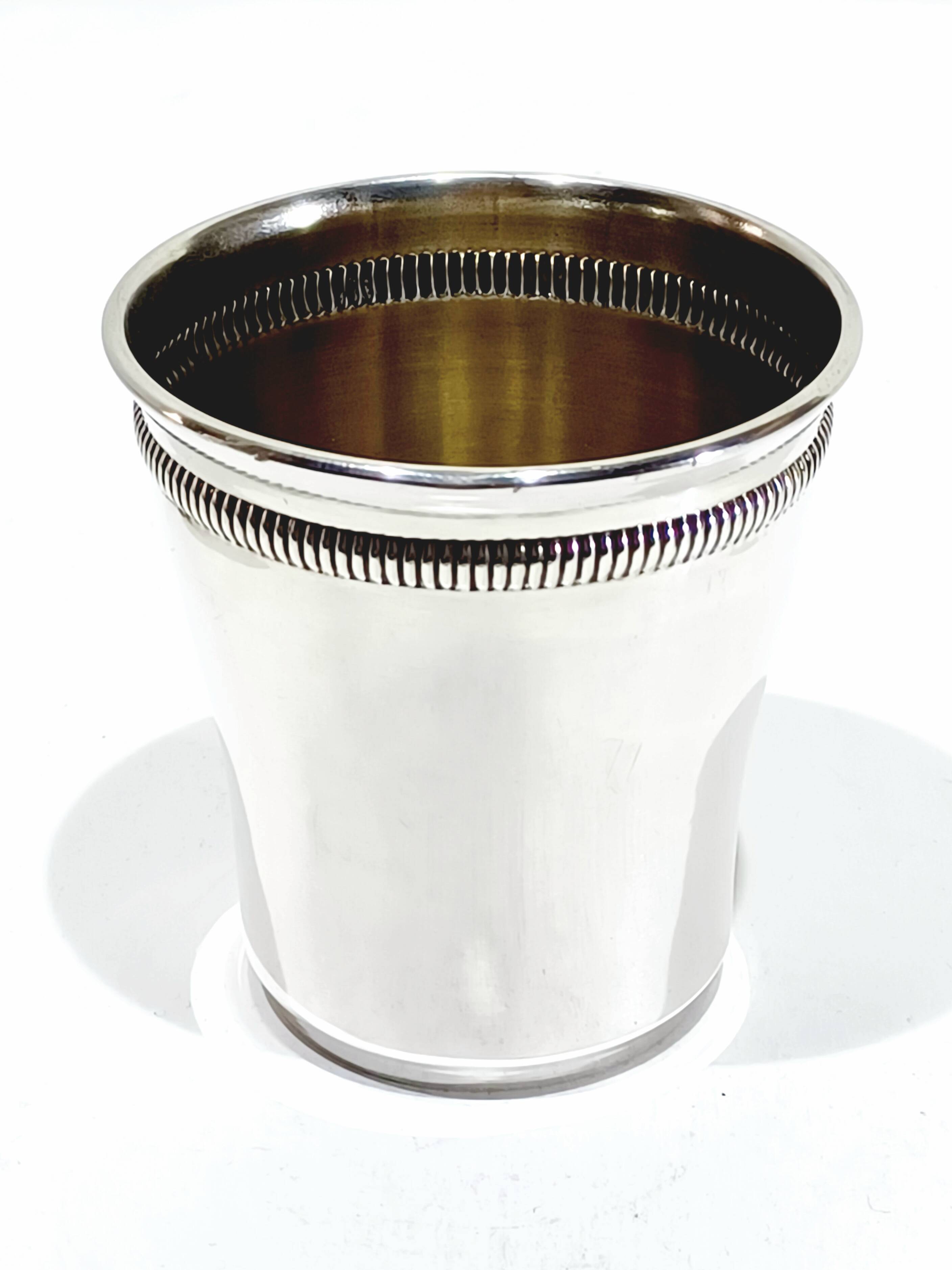 Solid silver cup with gadroon motif