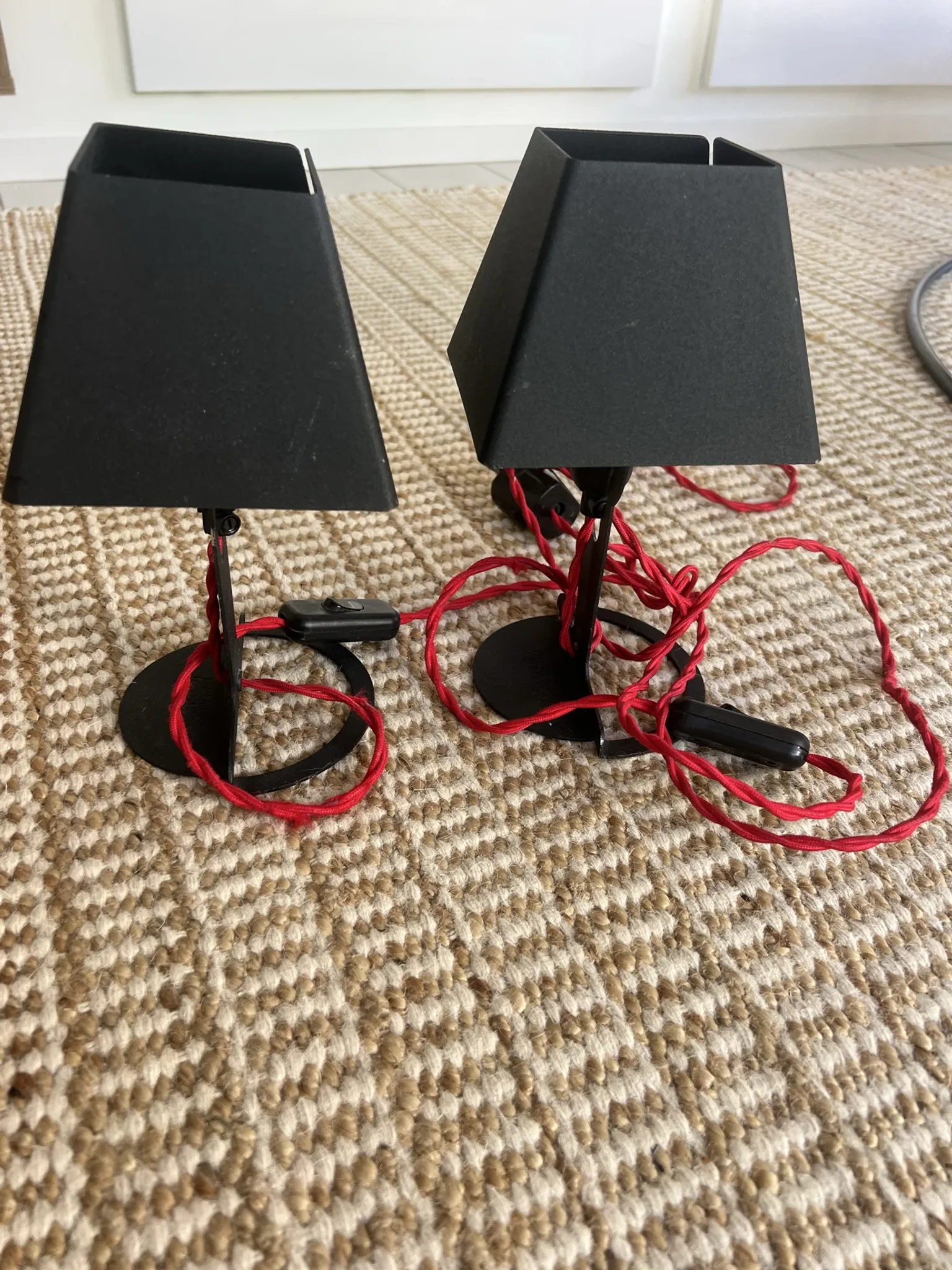 Two Established & Sons Fold T1 lamps by Alexander Taylor.