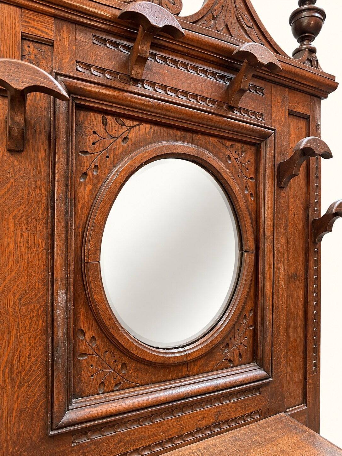 Napoleon III entrance hall wardrobe in solid oak with bevelled mirror.