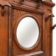 Napoleon III entrance hall wardrobe in solid oak with bevelled mirror.