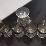 9 white wine glasses on vintage Luminarc smoked black stem