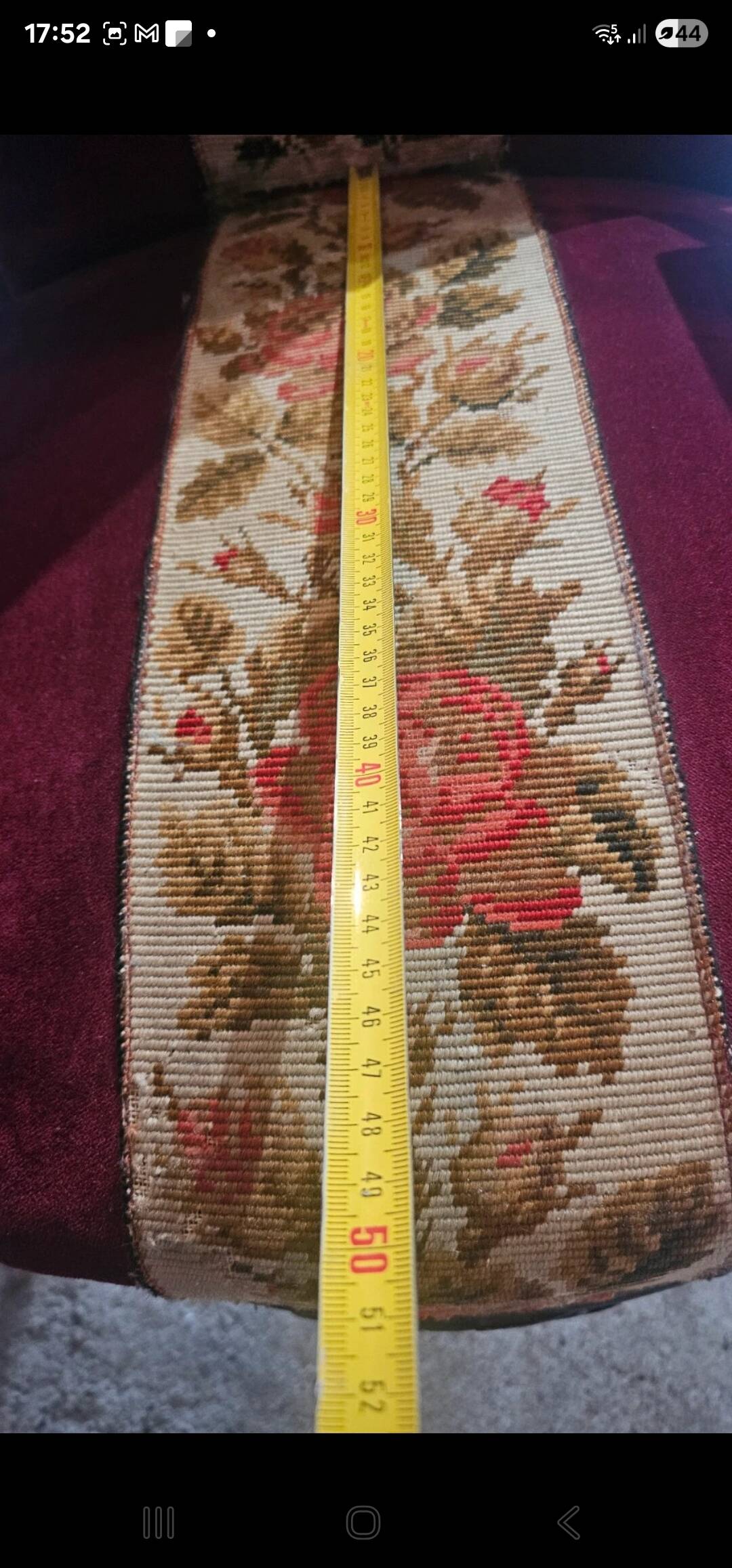 Louis-Philippe armchair in mahogany and burgundy velvet, floral decoration.