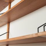 Classic wall shelf by Poul Cadovius for Cado, 1950s, teak veneer, 18 shelves, 4 ladders, Denmark
