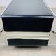 Chrome and black leather magazine rack, 1970s.