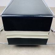 Chrome and black leather magazine rack, 1970s.