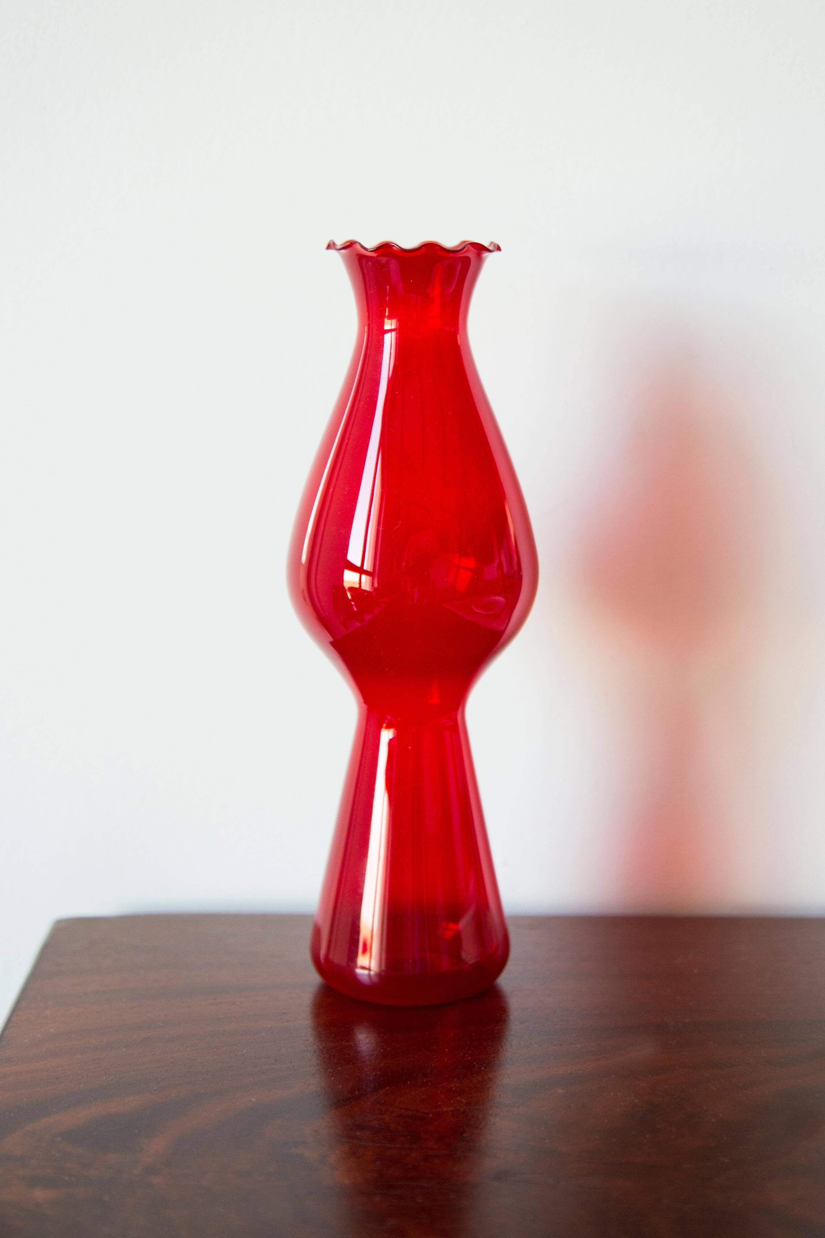 Thin red glass vase from the mid-century with a ruffle, Europe, 1960s