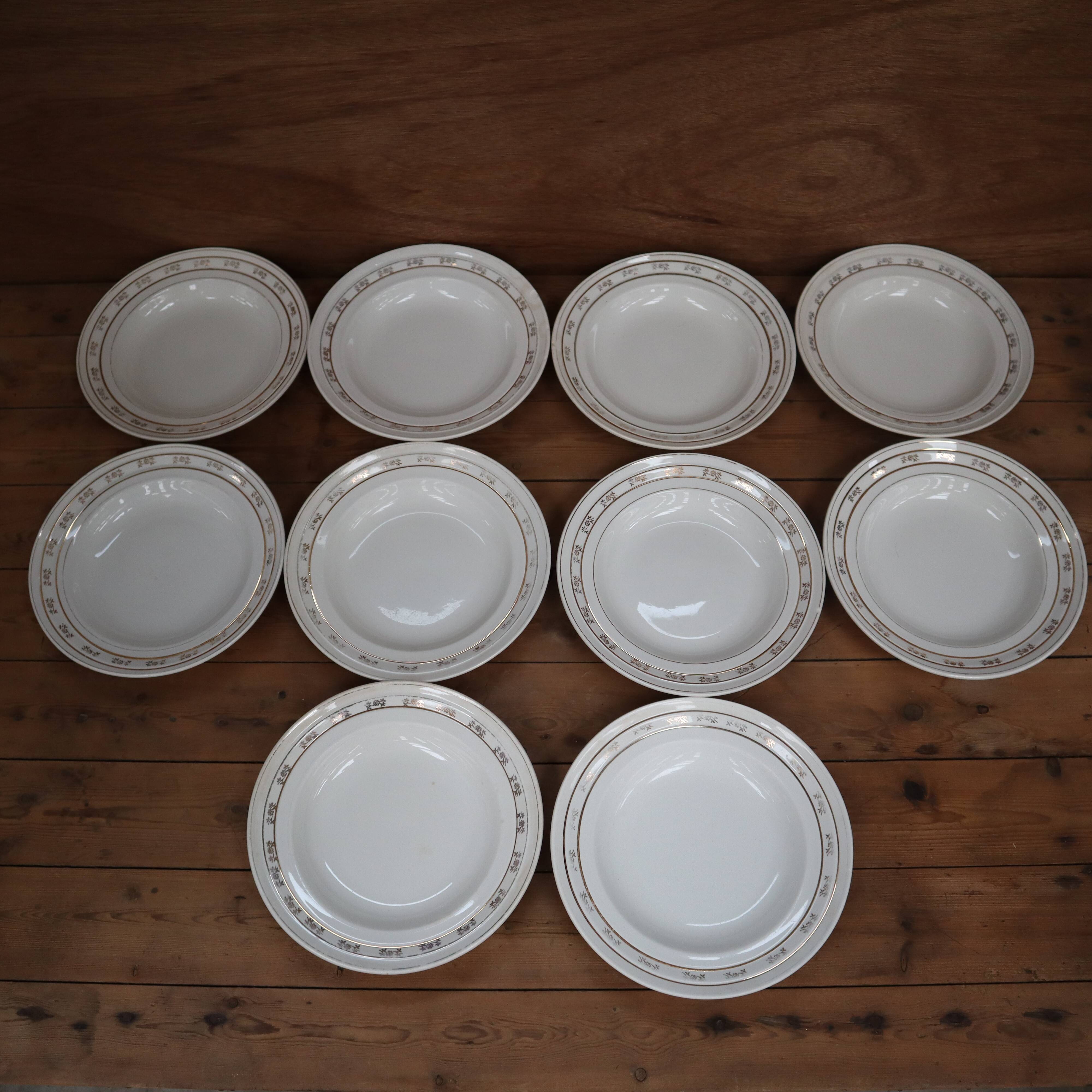 Set of 10 Saint Amand deep plates, "Marguerite" model