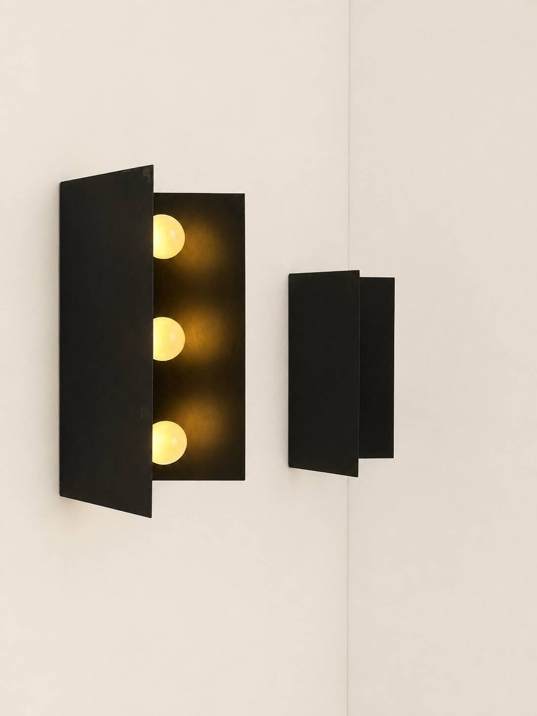 Pair of vintage wall sconces, black metal and chrome, France, 1970.