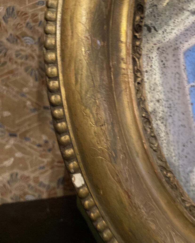 Mirror in gilded stucco nineteenth century