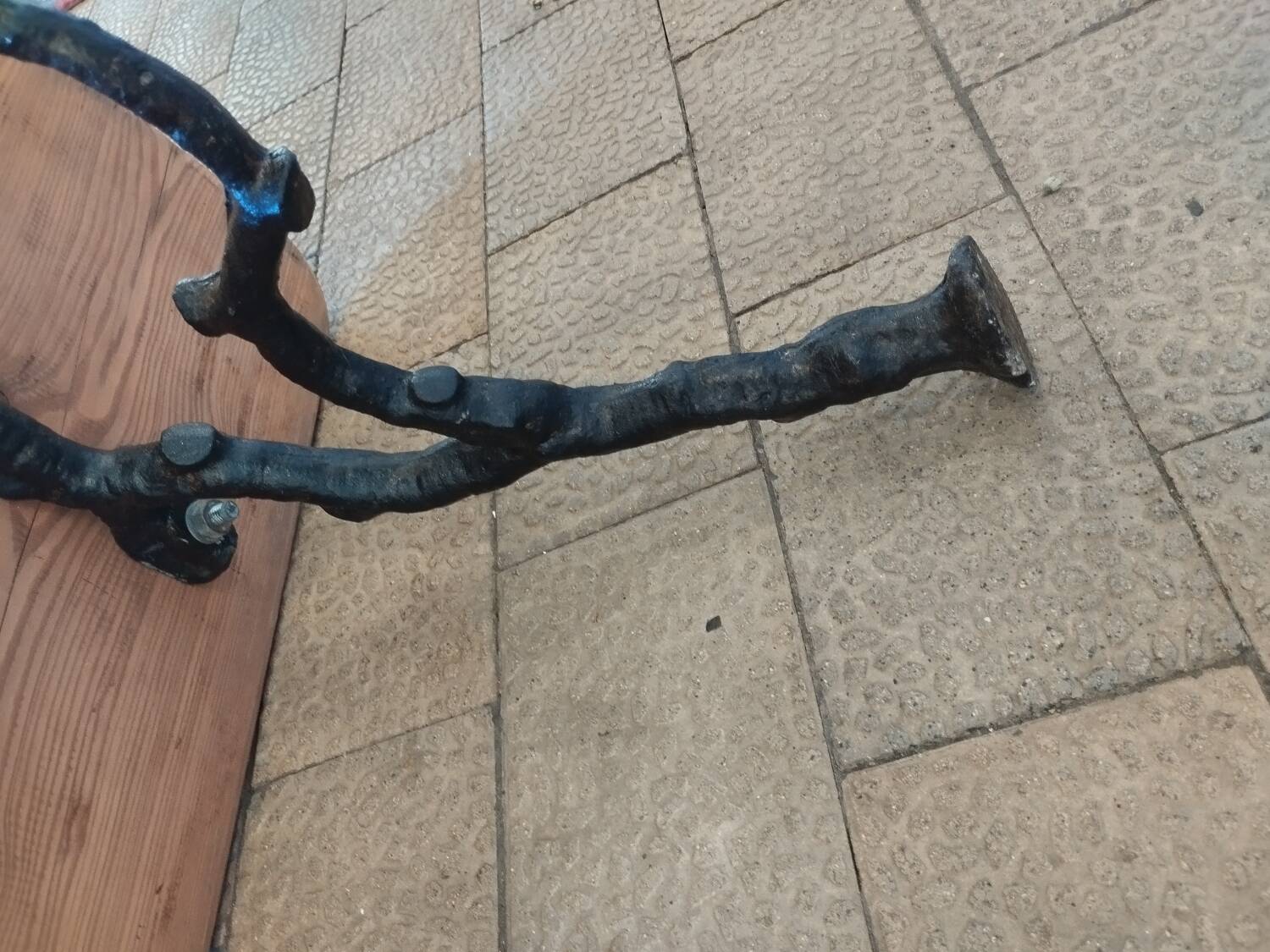 Antique garden bench with cast iron legs