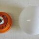 Ceiling light or wall lamp in orange ABS and opal globe - 1970s