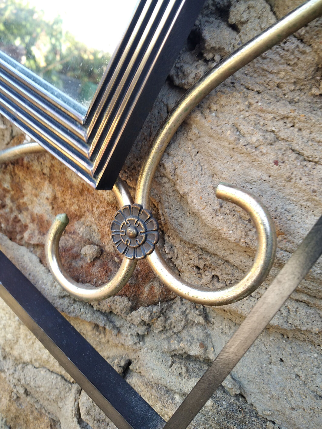 Forged iron mirror and gilded brass