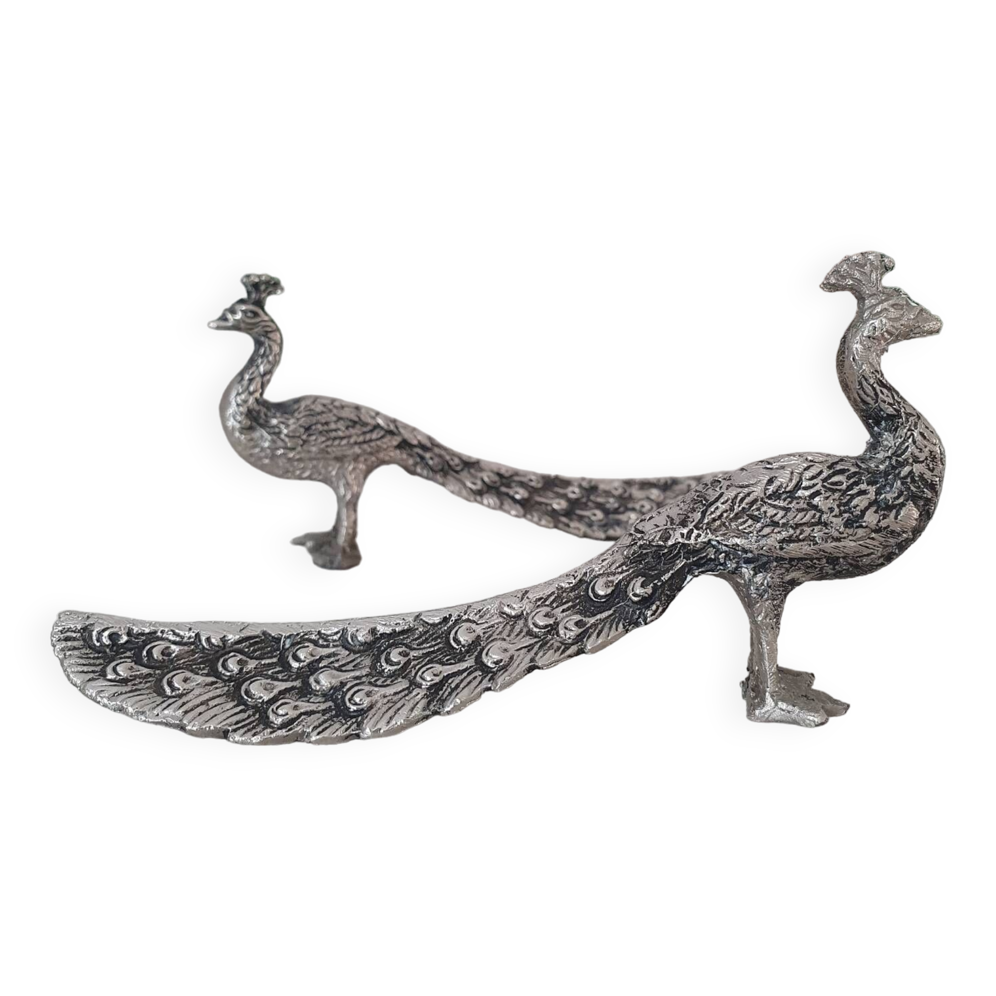 Silver metal peacock