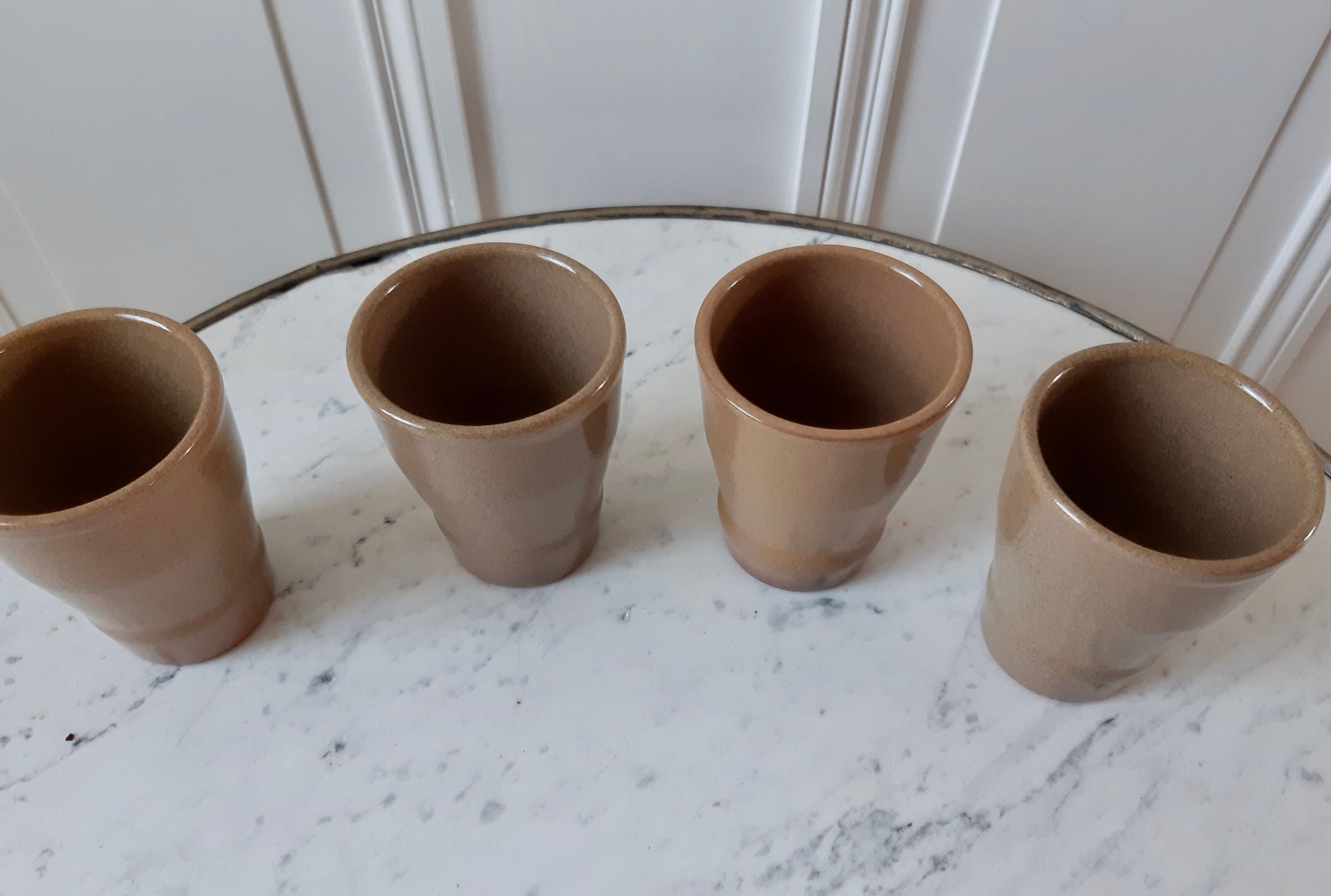 Lot of 4 sandstone glasses