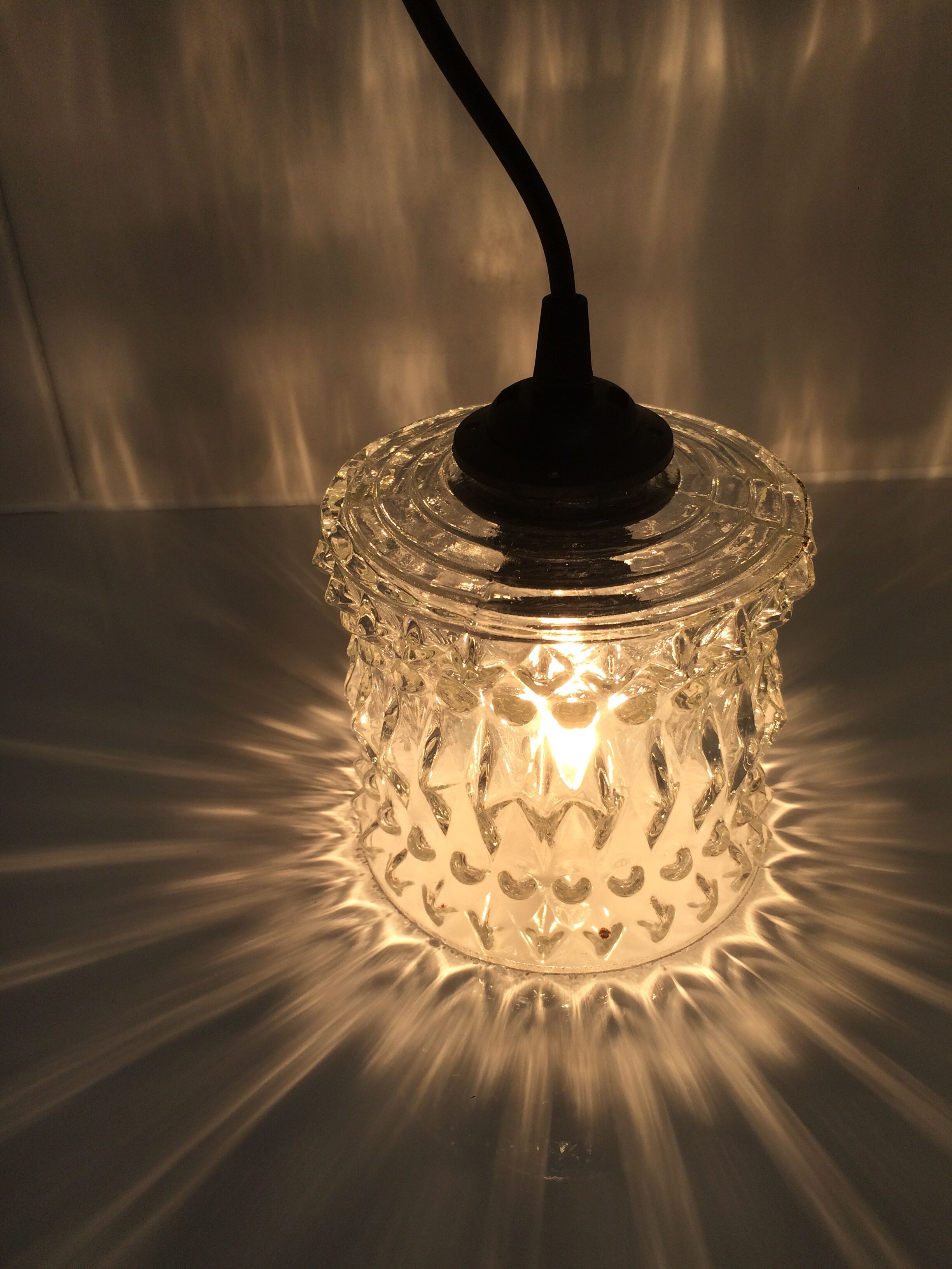 Chiseled glass suspension