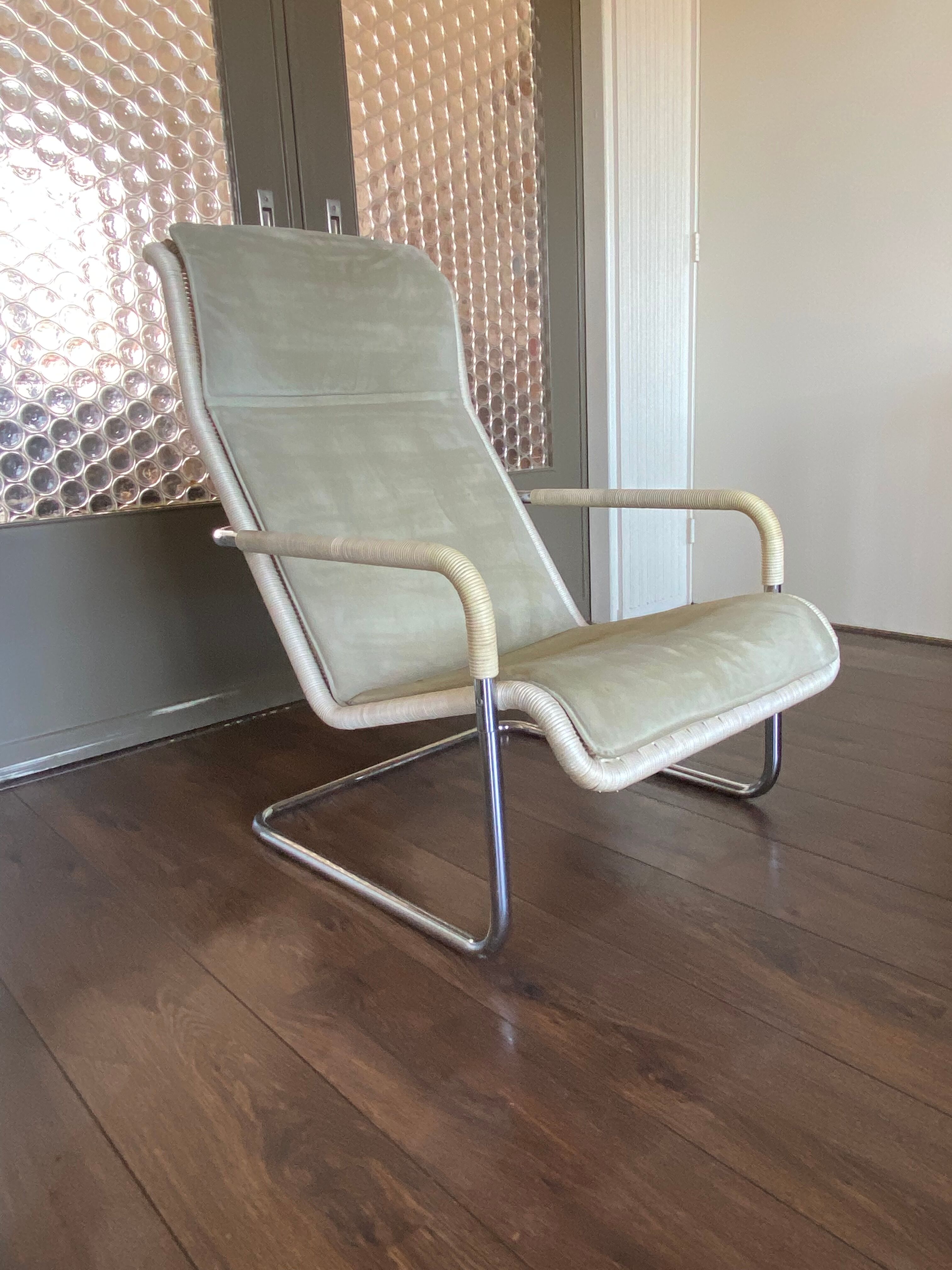Vintage modernist chromed tubular steel, rattan & leather easy chair