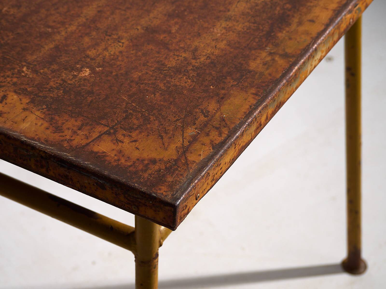 Antique ochre-colored outdoor table (c.1920)