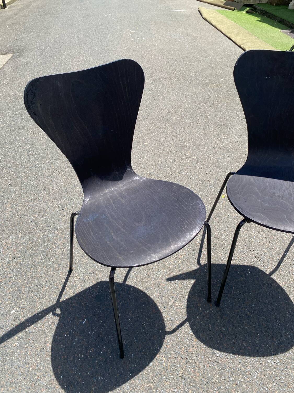 Pairs of wooden chairs