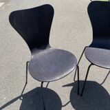 Pairs of wooden chairs