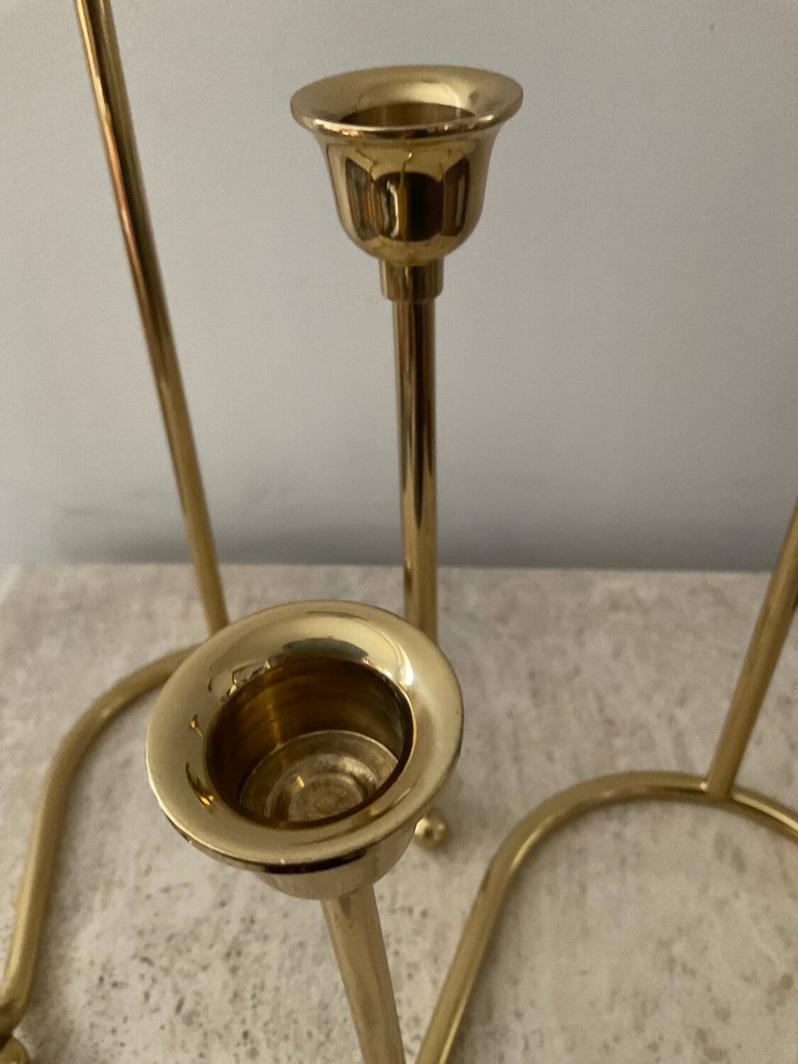 Duo of modernist brass candlesticks