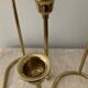 Duo of modernist brass candlesticks