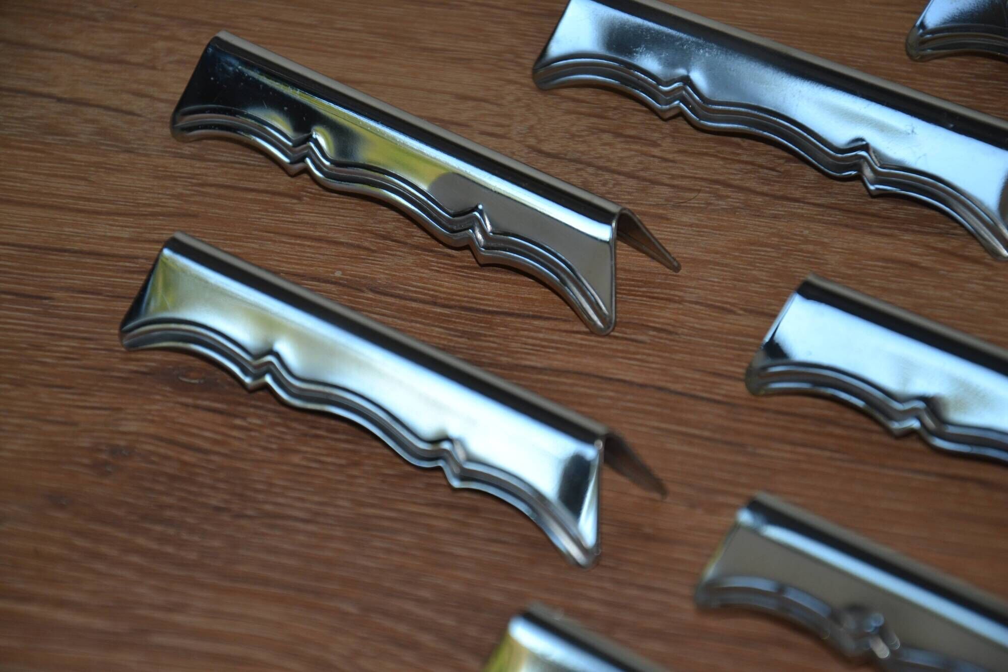 12 silver-plated knife rests