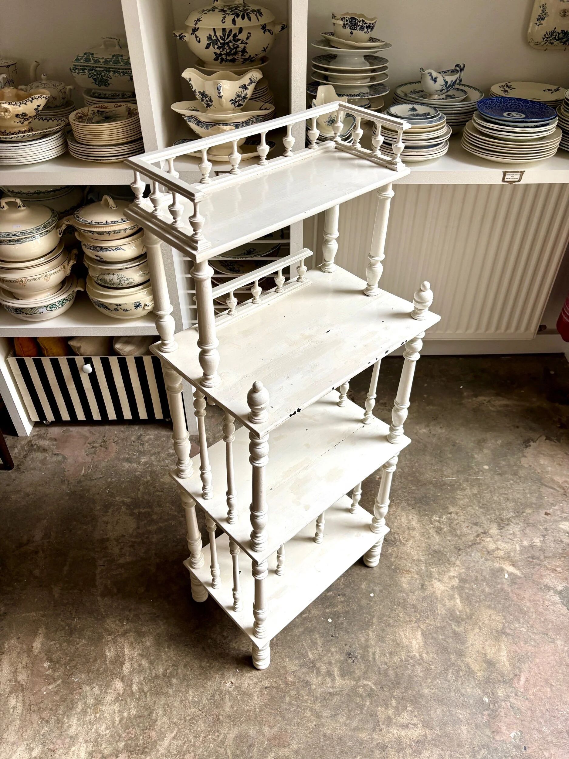 Library, white wooden sheet music cabinet.