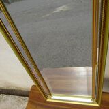 Hall mirror, gilded frame with fillets and fleur-de-lis.