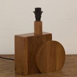 Pair of geometric handcrafted lamps in solid oak circa 1970.