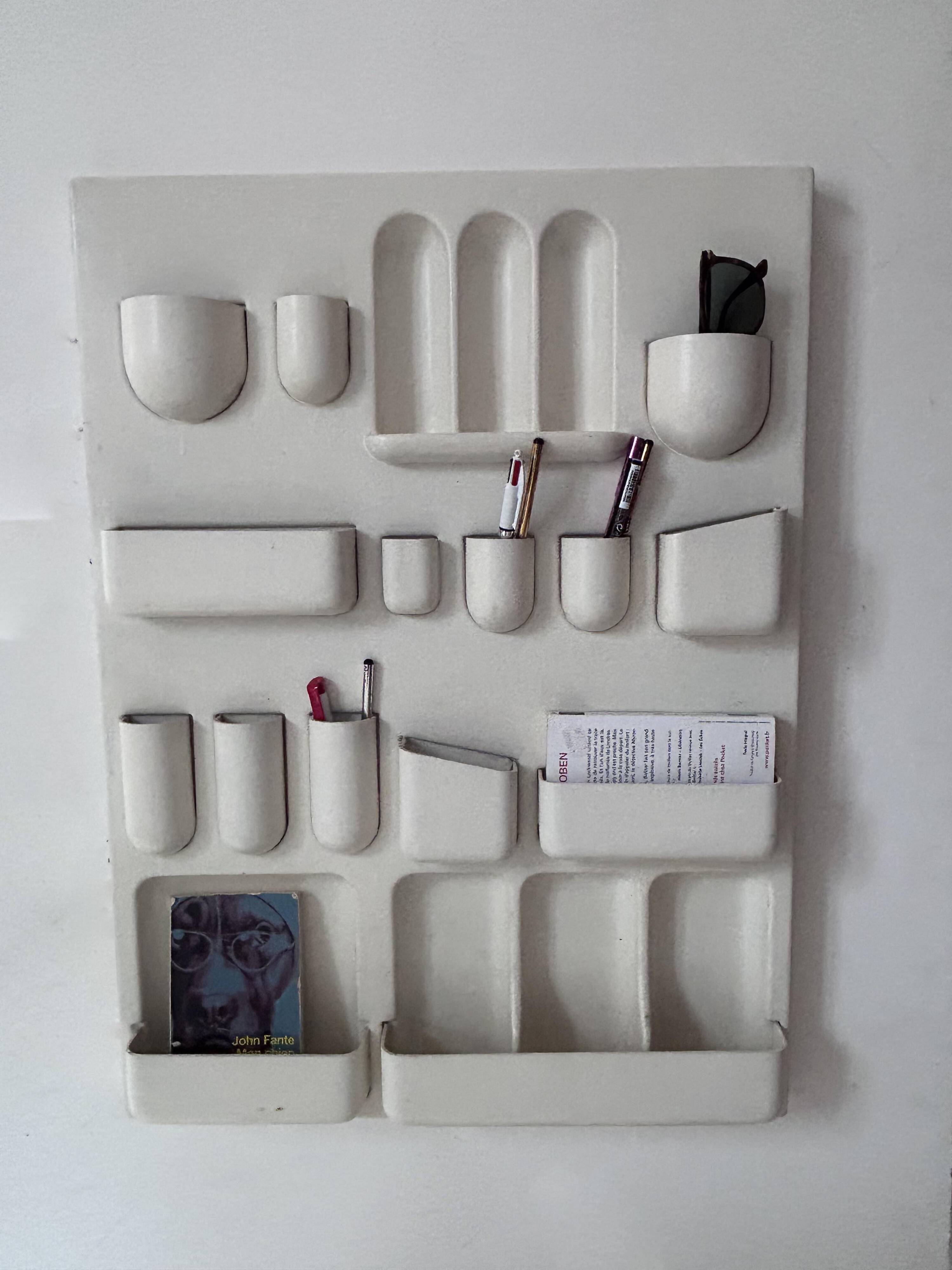 Vintage wall storage system in matte white ABS, Italy 1970s.