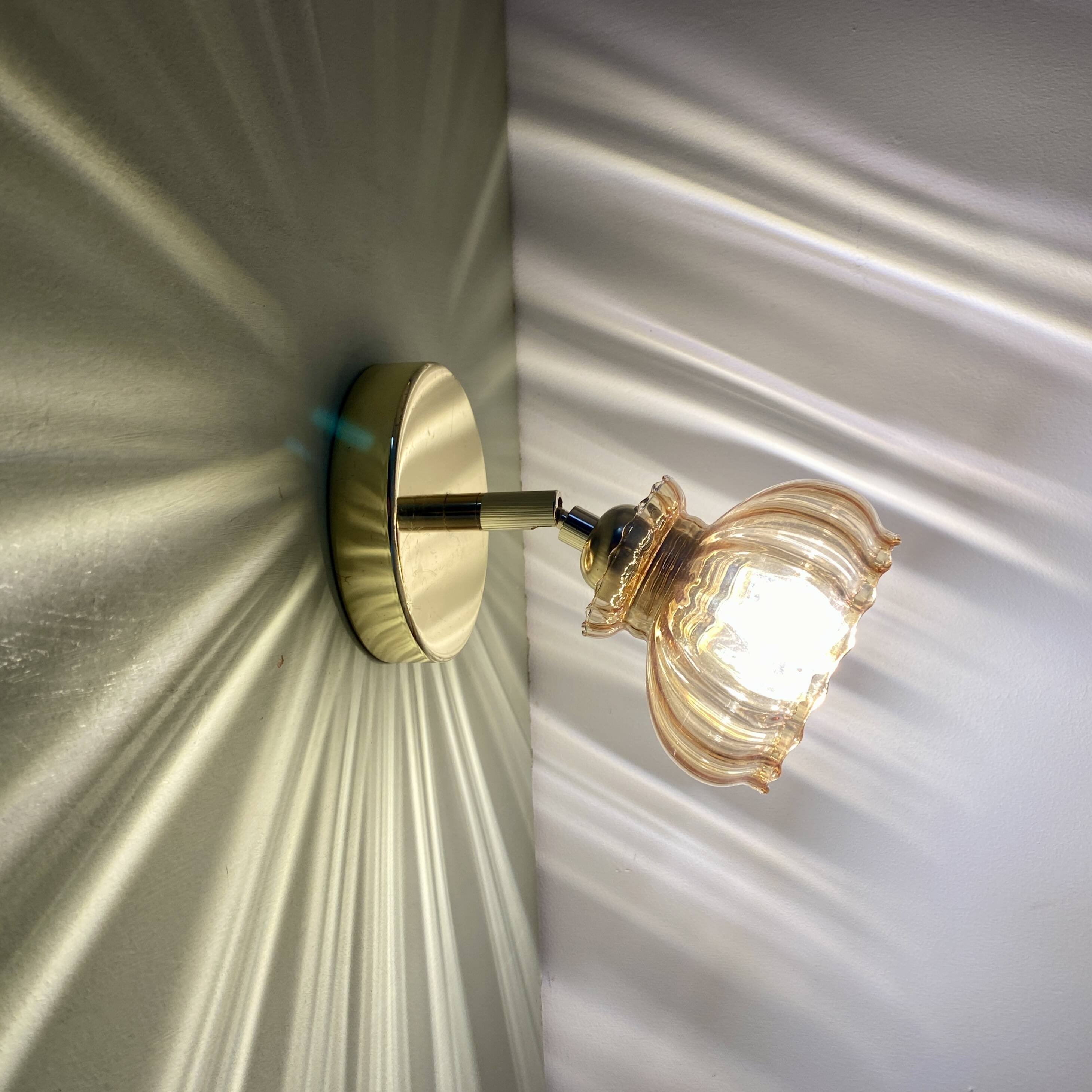 Vintage amber glass globe wall light