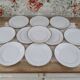 Lot de 11 assiettes à dessert en porcelaine suisse blanche double liseré doré